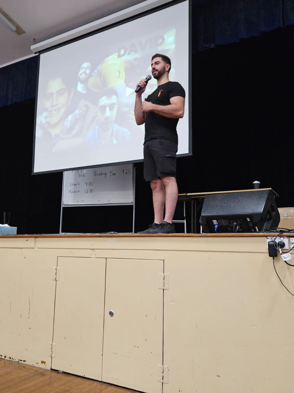 David presenting on stage